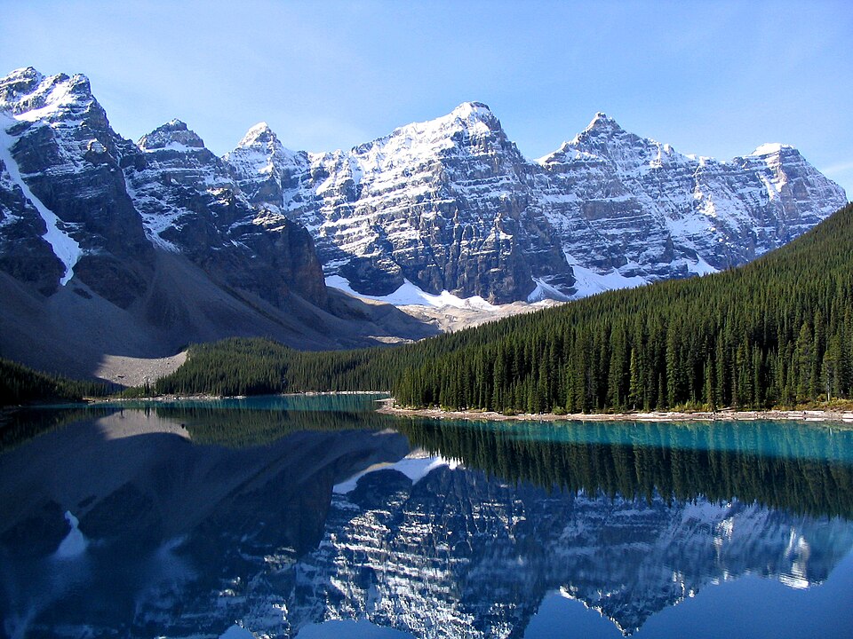 Moraine Lake in Banff National Park with snow-capped peaks reflected in turquoise water