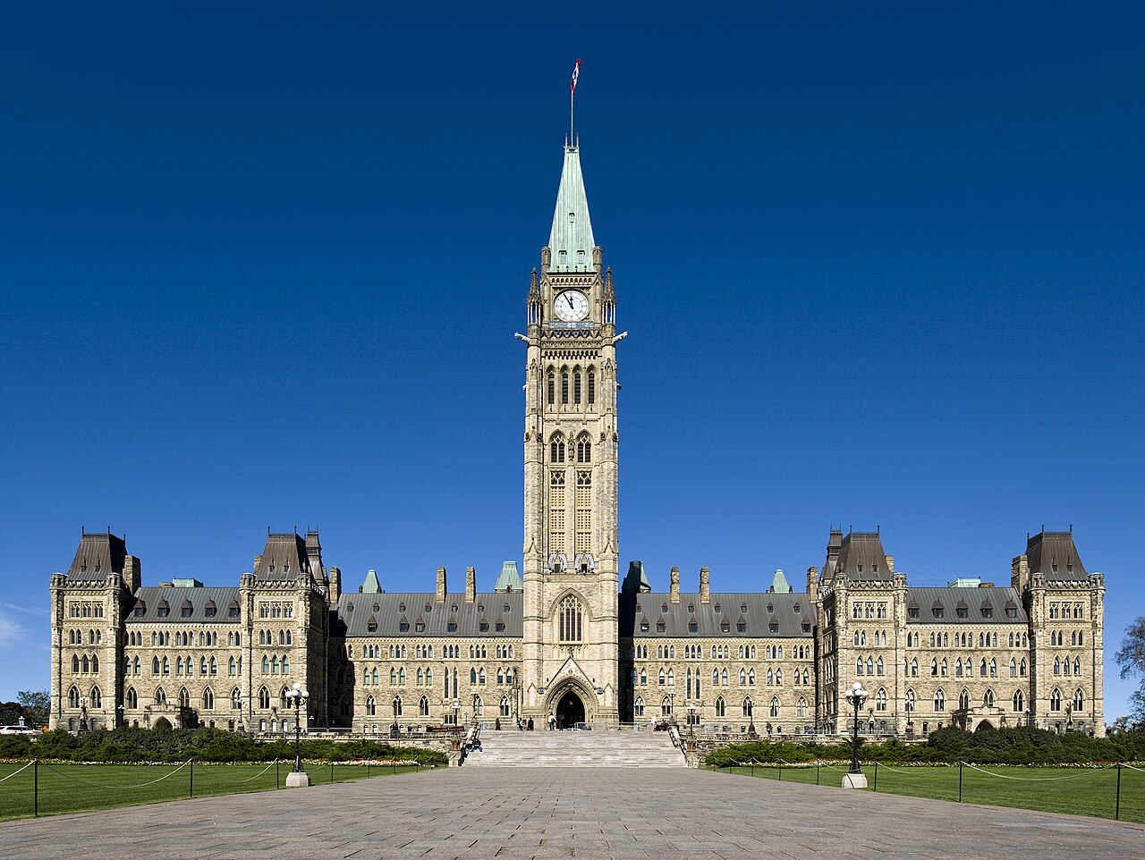 Centre Block and the Peace Tower on Parliament Hill in Ottawa under a deep blue sky